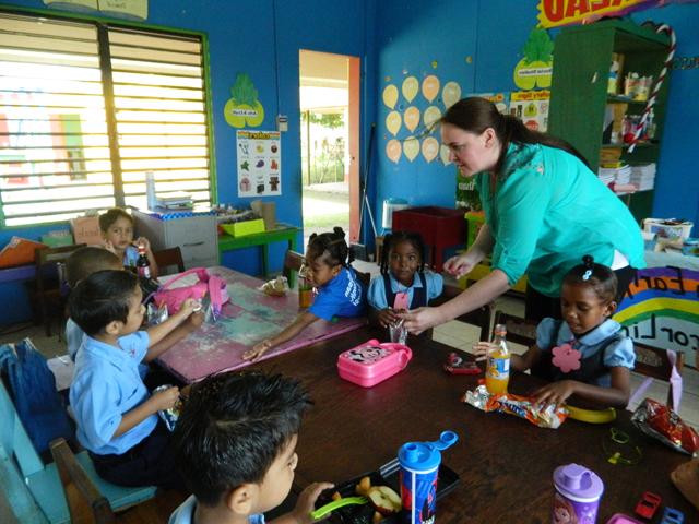 Rebecca Kimber, left, of Leitchfield, Ky., works with children on the Belize mission trip. Kimber is transferring to CU studying interdisciplinary early childhood education. (Campbellsville University Photo by Victoria Hundley)